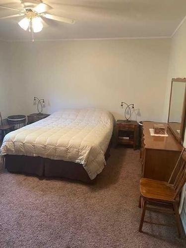 1103 Castledykes Court, Carstairs, AB - Indoor Photo Showing Bedroom