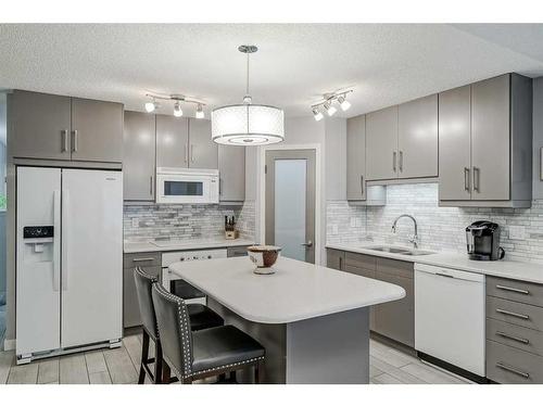 99 Chaparral Point Se, Calgary, AB - Indoor Photo Showing Kitchen With Upgraded Kitchen