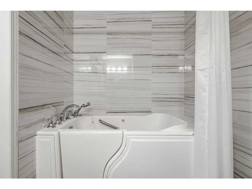 99 Chaparral Point Se, Calgary, AB - Indoor Photo Showing Laundry Room