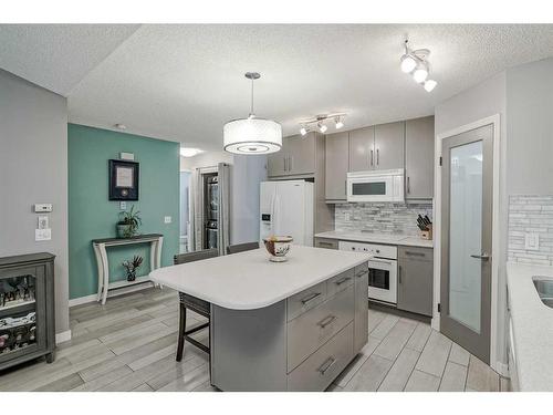 99 Chaparral Point Se, Calgary, AB - Indoor Photo Showing Kitchen With Upgraded Kitchen