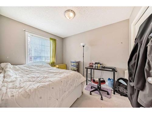 11194 Hidden Valley Drive Nw, Calgary, AB - Indoor Photo Showing Bedroom