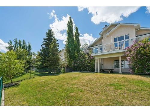 82 Gleneagles Close, Cochrane, AB - Outdoor With Deck Patio Veranda