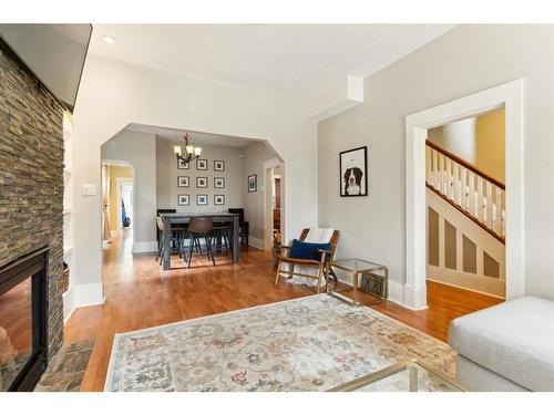 3819 Parkhill Street Sw, Calgary, AB - Indoor Photo Showing Living Room With Fireplace