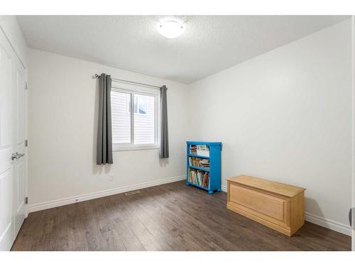 16 Hillcrest Link Sw, Airdrie, AB - Indoor Photo Showing Other Room