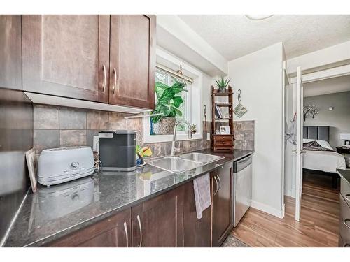 202-1908 11 Avenue Sw, Calgary, AB - Indoor Photo Showing Kitchen With Double Sink