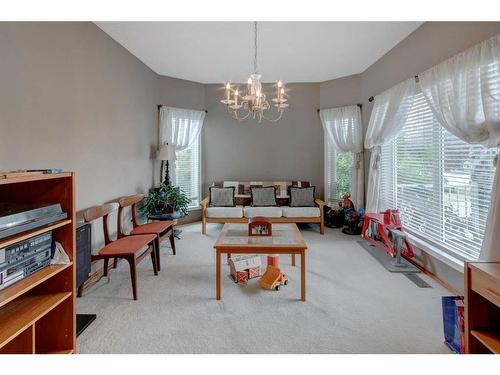 5 Rocky Ridge Gardens Nw, Calgary, AB - Indoor Photo Showing Living Room