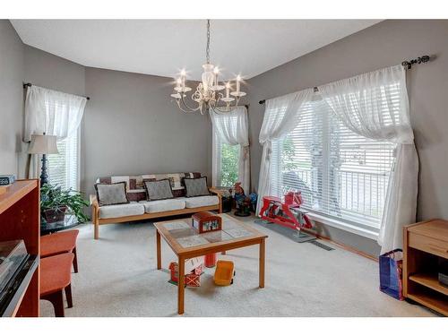 5 Rocky Ridge Gardens Nw, Calgary, AB - Indoor Photo Showing Living Room