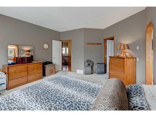 5 Rocky Ridge Gardens Nw, Calgary, AB - Indoor Photo Showing Bedroom