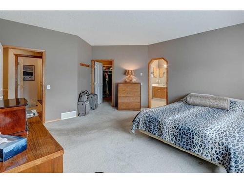 5 Rocky Ridge Gardens Nw, Calgary, AB - Indoor Photo Showing Bedroom