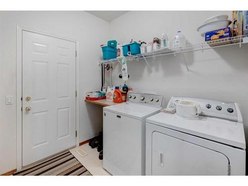 5 Rocky Ridge Gardens Nw, Calgary, AB - Indoor Photo Showing Laundry Room