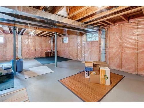 5 Rocky Ridge Gardens Nw, Calgary, AB - Indoor Photo Showing Basement