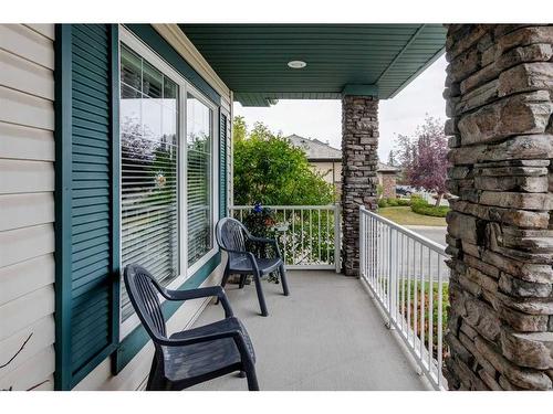 5 Rocky Ridge Gardens Nw, Calgary, AB - Outdoor With Deck Patio Veranda With Exterior