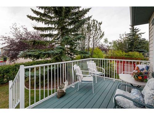 5 Rocky Ridge Gardens Nw, Calgary, AB - Outdoor With Deck Patio Veranda With Exterior