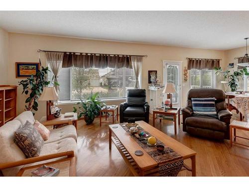 5 Rocky Ridge Gardens Nw, Calgary, AB - Indoor Photo Showing Living Room