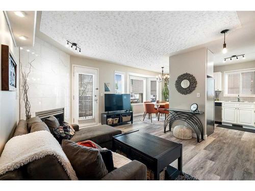 102-1516 11 Avenue Sw, Calgary, AB - Indoor Photo Showing Living Room