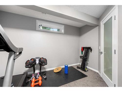 152 Chaparral Crescent Se, Calgary, AB - Indoor Photo Showing Gym Room