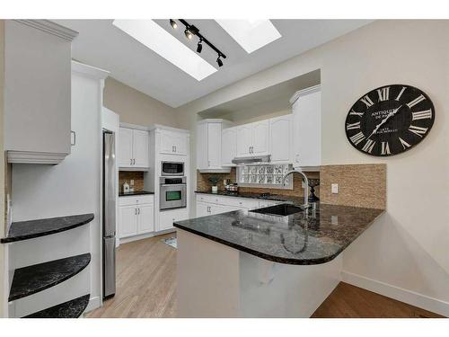 358 Mountain Park Drive Se, Calgary, AB - Indoor Photo Showing Kitchen