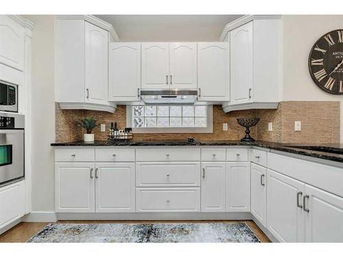 358 Mountain Park Drive Se, Calgary, AB - Indoor Photo Showing Kitchen