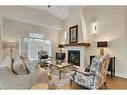 358 Mountain Park Drive Se, Calgary, AB  - Indoor Photo Showing Living Room With Fireplace 