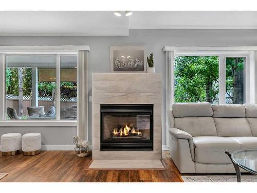 358 Mountain Park Drive Se, Calgary, AB - Indoor Photo Showing Living Room With Fireplace