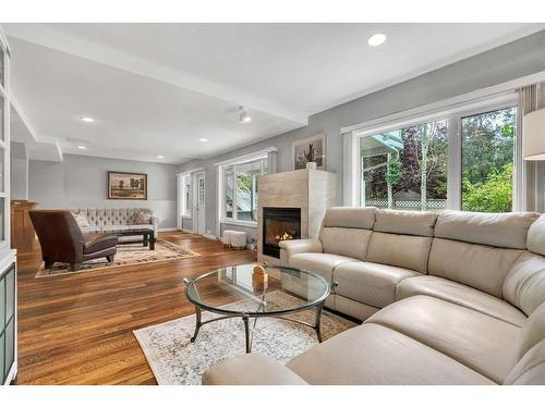 358 Mountain Park Drive Se, Calgary, AB - Indoor Photo Showing Living Room With Fireplace