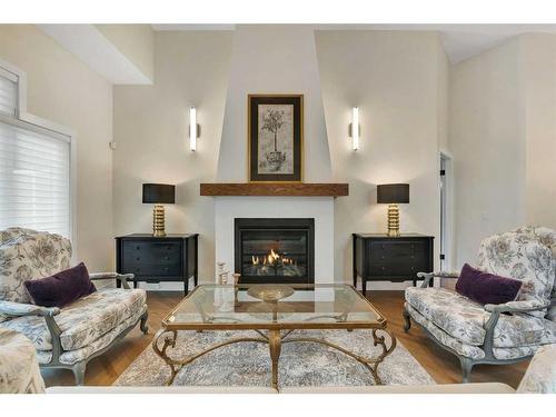 358 Mountain Park Drive Se, Calgary, AB - Indoor Photo Showing Living Room With Fireplace