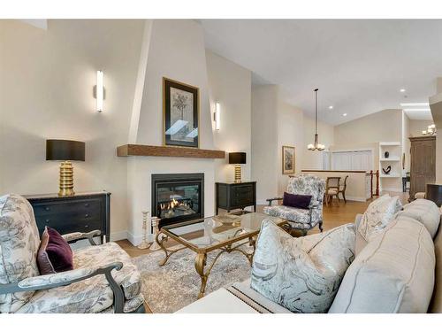 358 Mountain Park Drive Se, Calgary, AB - Indoor Photo Showing Living Room With Fireplace