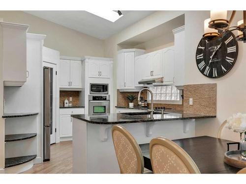 358 Mountain Park Drive Se, Calgary, AB - Indoor Photo Showing Kitchen With Upgraded Kitchen