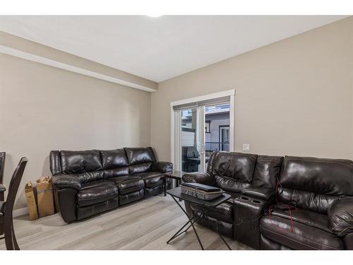 406-95 Skyview Close Ne, Calgary, AB - Indoor Photo Showing Living Room