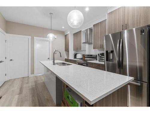 406-95 Skyview Close Ne, Calgary, AB - Indoor Photo Showing Kitchen With Stainless Steel Kitchen With Double Sink With Upgraded Kitchen