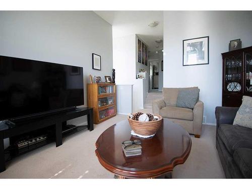 52 Everglen Way Sw, Calgary, AB - Indoor Photo Showing Living Room