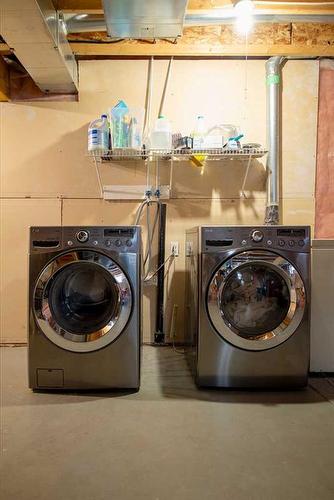 52 Everglen Way Sw, Calgary, AB - Indoor Photo Showing Laundry Room