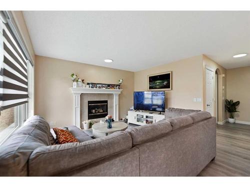 42 Martha'S Close Ne, Calgary, AB - Indoor Photo Showing Living Room With Fireplace