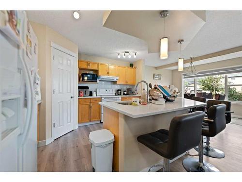 42 Martha'S Close Ne, Calgary, AB - Indoor Photo Showing Kitchen With Double Sink