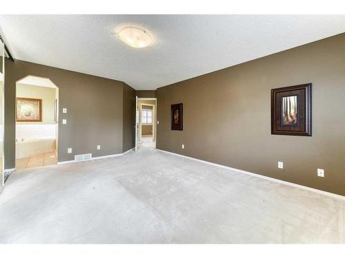 55 Bridlepost Green Sw, Calgary, AB - Indoor Photo Showing Other Room