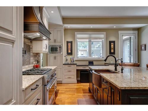 915 24 Avenue Nw, Calgary, AB - Indoor Photo Showing Kitchen With Double Sink With Upgraded Kitchen