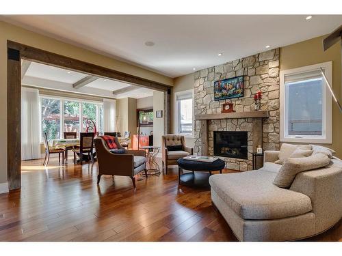 915 24 Avenue Nw, Calgary, AB - Indoor Photo Showing Living Room With Fireplace