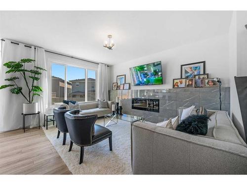 171 Red Sky Crescent Ne, Calgary, AB - Indoor Photo Showing Living Room With Fireplace