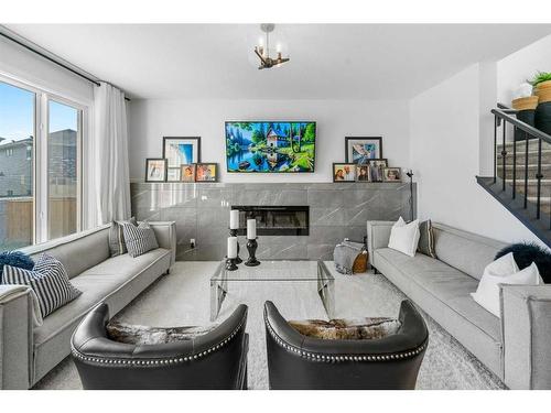 171 Red Sky Crescent Ne, Calgary, AB - Indoor Photo Showing Living Room With Fireplace