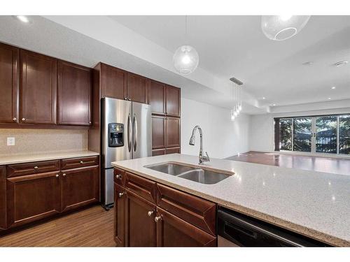 3-1940 24A Street Sw, Calgary, AB - Indoor Photo Showing Kitchen With Double Sink With Upgraded Kitchen