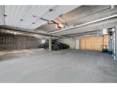 3-1940 24A Street Sw, Calgary, AB - Indoor Photo Showing Garage