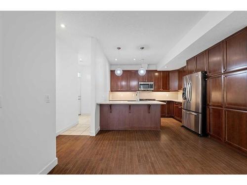 3-1940 24A Street Sw, Calgary, AB - Indoor Photo Showing Kitchen With Upgraded Kitchen