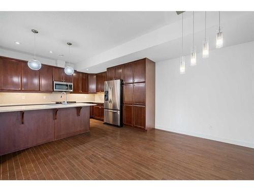 3-1940 24A Street Sw, Calgary, AB - Indoor Photo Showing Kitchen With Upgraded Kitchen