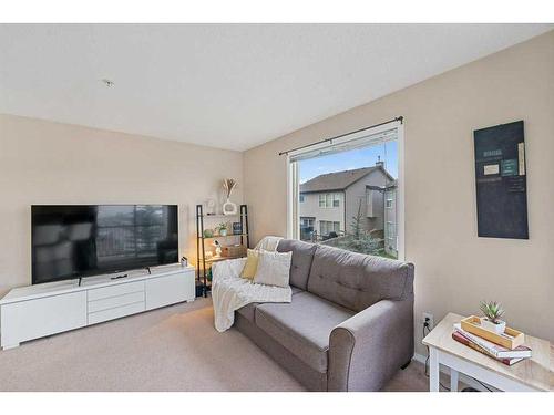 1202-16969 24 Street Sw, Calgary, AB - Indoor Photo Showing Living Room