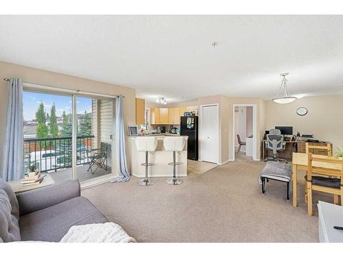 1202-16969 24 Street Sw, Calgary, AB - Indoor Photo Showing Living Room