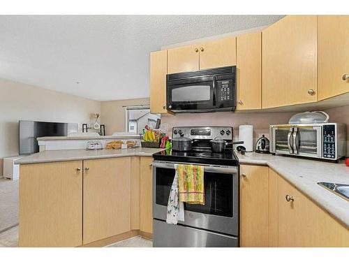 1202-16969 24 Street Sw, Calgary, AB - Indoor Photo Showing Kitchen