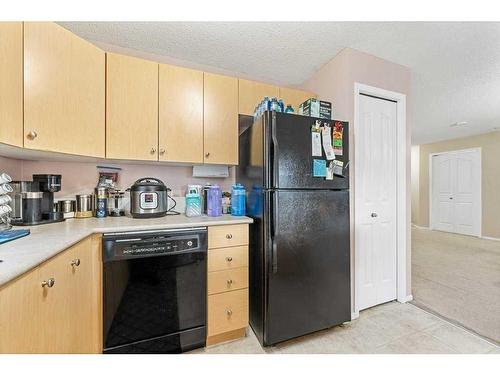 1202-16969 24 Street Sw, Calgary, AB - Indoor Photo Showing Kitchen