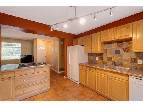 4148 42 Street Sw, Calgary, AB - Indoor Photo Showing Kitchen With Double Sink