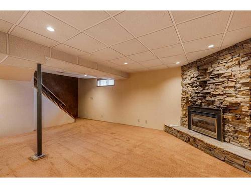 4148 42 Street Sw, Calgary, AB - Indoor With Fireplace