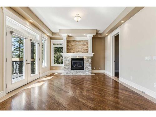 5220 Montalban Avenue Nw, Calgary, AB - Indoor Photo Showing Living Room With Fireplace